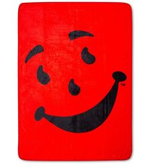 a red towel with a black smiley face on it