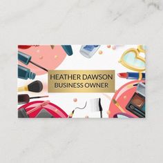 a business card with makeup products and cosmetics items on the front, in gold foil