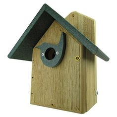 a wooden birdhouse with a black roof and gray window on the outside, attached to a white background