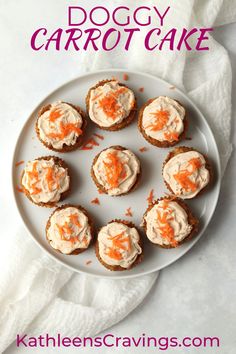 a white plate topped with cupcakes covered in frosting