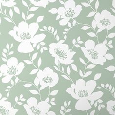 a white flower pattern on a green wallpaper with leaves and flowers in the background