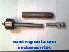 two screws are sitting next to each other on a piece of paper that says contrapunta con rodamientos