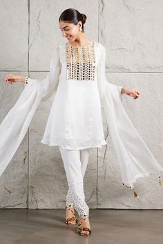 White A-line kurta featuring mirror hand embroidery on the yoke and sleeve hem. Paired with a mirror, crystal detailed pant and a dupatta. - Aza Fashions Embroidery Mirror, Mirror Embroidery, Fitted Pants, Satin Hands, Mirror Round, White Kurta, Detailed Embroidery, A Line Kurta, Satin Color