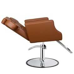 a brown leather chair sitting on top of a metal base with a foot rest in front of it