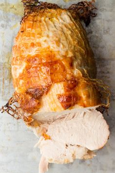 an uncooked chicken breast is shown on a baking sheet with the skin removed