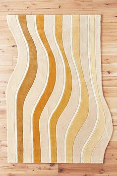 an area rug with wavy lines on it