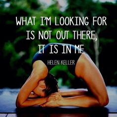 a woman laying on the ground with her hands behind her head and an inspirational quote about looking for is not out there, it's in me