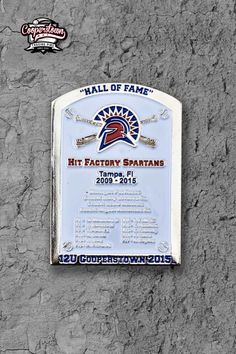 a plaque on the side of a building that reads hall of fame hit factory spartans