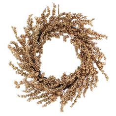 a wreath made out of dried flowers on a white background