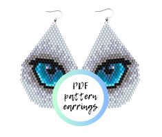 a pair of beaded earrings with the words ppf pattern earings on it