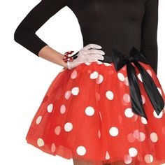 a woman wearing a minnie mouse costume