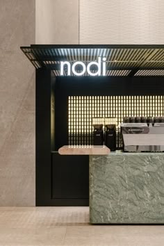 the front counter of a restaurant with noodle written on it