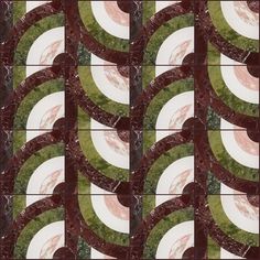 an abstract tile design in red and green