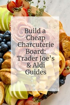 a platter filled with lots of different types of fruit and bread on top of a table