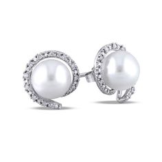 A mesmerizing look, these pearl and diamond earrings transition perfectly from day into evening. Fashioned in 10K white gold, each clever earring features a luminous 8.0-8.5mm cultured freshwater pearl center stone surrounded by a sculpted ribbon lined with shimmering diamonds. Captivating with 1/10 ct. t.w. of diamonds and a brilliant buffed luster, these post earrings secure comfortably with friction backs. Fine Jewelry White Gold Pearl Earrings With Diamond Accents, Diamond White Pearl Earrings With Diamond Accents, Diamond White Pearl Earrings With Diamond Accents For Anniversary, Sterling Silver Pearl Earrings With Diamond Accents For Anniversary, Anniversary Pearl Earrings With Diamond Accents, Sterling Silver Round Cut Pearl Earrings With Diamond Accents, Sterling Silver Pearl Earrings With Diamond Accents, White Gold Pearl Earrings With Halo Design For Anniversary, Anniversary White Gold Pearl Earrings With Halo Design