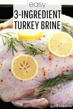 a whole turkey with lemons and rosemary on the side, text overlay says easy 3 - ingredient turkey brine