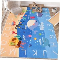 a child's rug with an ocean theme on it