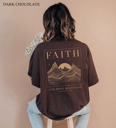 Faith Can Move Mountains Matthew 17:20 bible verse Christian Shirt. * K E E P * S H O P P I N G *   ✺ Check out this design on a Crewneck here:  https://www.etsy.com/ie/listing/1714472384/faith-can-move-mountains-christian? ✺ Check out this design on a Hoodie here:  https://www.etsy.com/ie/listing/1704614617/christian-hoodies-jesus-hoodie-christian? ✺ Shop our entire Quite Nice Studios collection here:  https://www.etsy.com/shop/QuiteNiceStudio * Q U I C K * F A C T S * ✺ 100% preshrunk cotton ✺ Wash (inside out) and dry normally (on cool for best results) * S I Z I N G * ✺ Sizing is unisex so runs like men's, though not overly large ✺ Most women find their typical size works best, since they are meant to fit a touch loose ✺ For an oversized look size up 1-2+ sizes! ✺ Size guide and fit: S Christian Boho Outfits, Jesus Merch, Christian Style, Christian Clothes, Christian Tshirt Design, Christian Crewneck, Bible Shirts, Matthew 17, Christian Shirts Designs