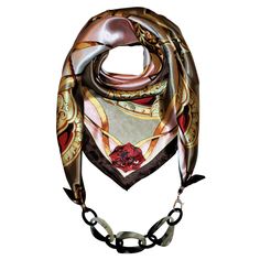 DESCRIPTION Add a glamour statement to your everyday look with one of a kind handmade BellaLunas Jewelry Scarf. A fusion of soft silky satin, handcrafted buffalo horn chain and gold plated hardware full of crystals will instantly put you in the spotlight. From business casual to everyday wear, don’t just wear a jewelry scarf, flaunt it. This show stopping jewelry scarf will add a statement to any outfit. With adjustable length, it can be worn long or short. Visit the BELLALUNAS style guide to vi Silk Jewelry, Horn Necklace, Bandana Scarf, Versatile Jewelry, Beige Background, Scarf Jewelry, Patterns In Nature, Black Print, Unique Patterns