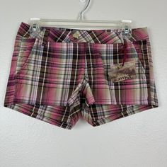 Nwt Paris Blues Low Rise Micro Mini Plaid Shorts Y2k Style Pink Brown Shimmer 3 Low Rise Micro Mini Shorts. Zip And Button Closure. Belt Loops. 2 Hand Pockets. 2 Back Flap Pockets With Button Closure. Plaid In Pinks And Browns With Some Metallic Shimmer Threading. New With Tags. Size 3 Juniors. Approximate Measurements: Waist Across-14.5" Inseam-2.5" Rise-7.5" Y2k Bottoms With Built-in Shorts, Fitted Pink Shorts With Pockets, Y2k Pink Bottoms For Summer, Y2k Shorts With Pockets, Y2k Style Bottoms With Built-in Shorts, Y2k Mid-rise Cotton Shorts, Y2k Style Pink Bottoms For Summer, Y2k Style Mid-rise Cotton Shorts, Y2k Mid-rise Shorts With Pockets