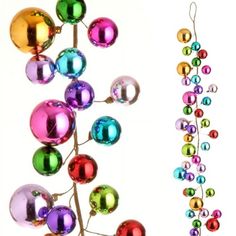 an image of christmas ornaments hanging on a tree branch and in front of a white background