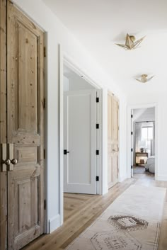 the instagram page on instagram com shows an image of a bedroom with white walls and wood floors