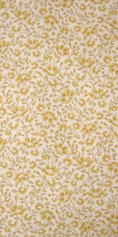 a yellow and white wallpaper with leaves on it