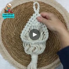 the video shows how to crochet an ornament with yarn and cotton