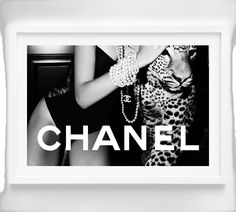 a black and white photo with the word chanel on it