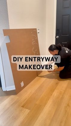 a woman kneeling on the floor next to a cardboard box that says diy entryway makeover