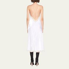 Miu Miu velvet slip dress with lace trim V neckline Spaghetti straps; crisscross back Bias cut silhouette Midi length Slipover style Viscose/silk Made in Italy Slip Dress With Lace, Velvet Slip Dress, Dress With Lace Trim, Velvet Midi Dress, Midi Slip Dress, Velvet Lace, Lace Hem, Lace Insert, Dress With Lace