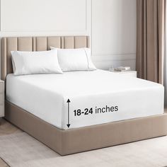 an image of a bed with measurements for the mattress topper and pillows on it