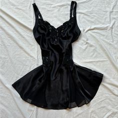 Victoria’s Secret Gorgeous Black Slip Dress. Size: Medium Brand: Victoria's Secret Description: Beautiful Deep Black Slip Dress With Mesh Panels And Lace And Beaded Detailing Made In The 1990’s Colors: Black Beautiful Lace Beaded Trim Lace Beaded Detailing In Center Adjustable Straps Perfect Condition Black Mesh Sheer Slots On Bust Black, Beaded, Lace, Lingerie,Ballerina Core, Slip Dress Thick Ribbon Spaghetti Straps Also Selling In White In My Page Makeup Body: 100% Polyester Trim: 100% Nylon W Lace Slip Mini Dress, Ballerina Core, Black Slip Dress, Mini Slip Dress, Lace Slip, Beaded Top, Lace Lingerie, Beaded Trim, Deep Black