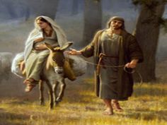 a man and woman are walking with a horse in the woods, one is dressed as jesus