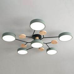 a circular light fixture with several lights on it