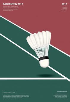 the badminton racket is flying through the air in front of a red and green background