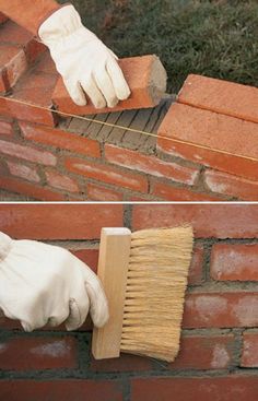 a brick wall being worked on with a brush and sponge to clean the mortars