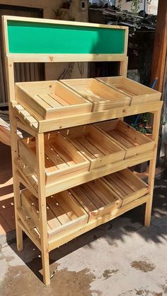 a wooden shelf sitting on top of a sidewalk