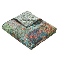 a multicolored blanket with floral designs on it