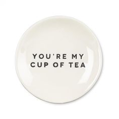 a white plate with the words you're my cup of tea printed on it