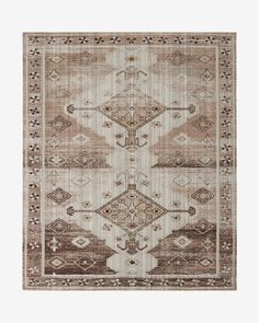 a beige and brown rug with an intricate design on the front, in two different colors