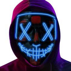 a person wearing a neon mask with red and blue lights in the shape of a skull