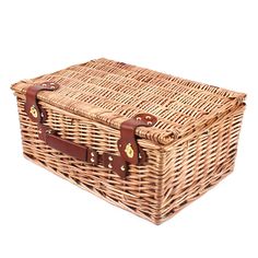 a large wicker basket with leather handles