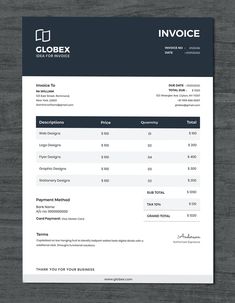 an invoice is shown on top of a wooden table