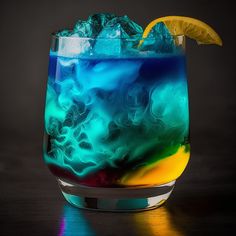 a colorful drink with ice and lemon wedges