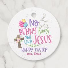 a white ceramic ornament with the words, no bunny loves you like jesus