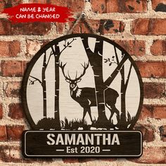 a wooden sign that reads, name and year can be changed with the image of a deer