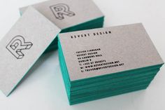 several business cards stacked on top of each other with the letter r in black and white