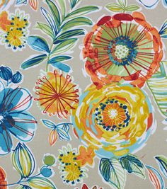 an orange, yellow and blue flower pattern on fabric