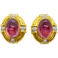 Classic 18 karat yellow gold clip on earrings, centering cabochon oval Pink Tourmalines and round brilliant Diamond accents. The earrings measure 1" x 1" approximately. Posts can be added. Stamped with the jewelers hallmark Pink Tourmalines weight apprx. 22.00 Diamond weight 0.55 carats Luxury Round Cabochon Clip-on Earrings, Luxury Cabochon Clip-on Earrings For Formal Occasions, Luxury Formal Clip-on Earrings With Cabochon, Oval Yellow Gold Cabochons For Formal Events, Formal Gold Clip-on Cabochons, Formal Clip-on Earrings With Oval Cabochon, Oval Earrings With Gemstone Accents For Formal Occasions, Oval Gemstone Accented Earrings For Formal Occasions, Formal Yellow Gold Gemstone Clip-on Earrings